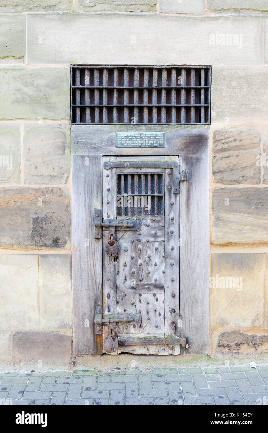 Original outer door of a prison cell formerly within the county gaol in Barrack Street, Warwick, UK Stock Photo