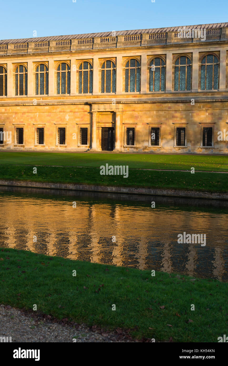 Scenic view of the Wren Library at sunset, Trinity College, Cambridge University; with punting in front on the river Cam, UK. Stock Photo