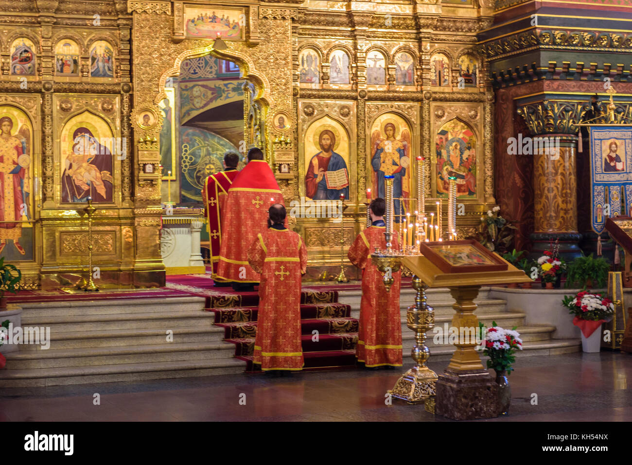 Religious Mass People in a religious mass in the Church of the Assumption of Mary ...