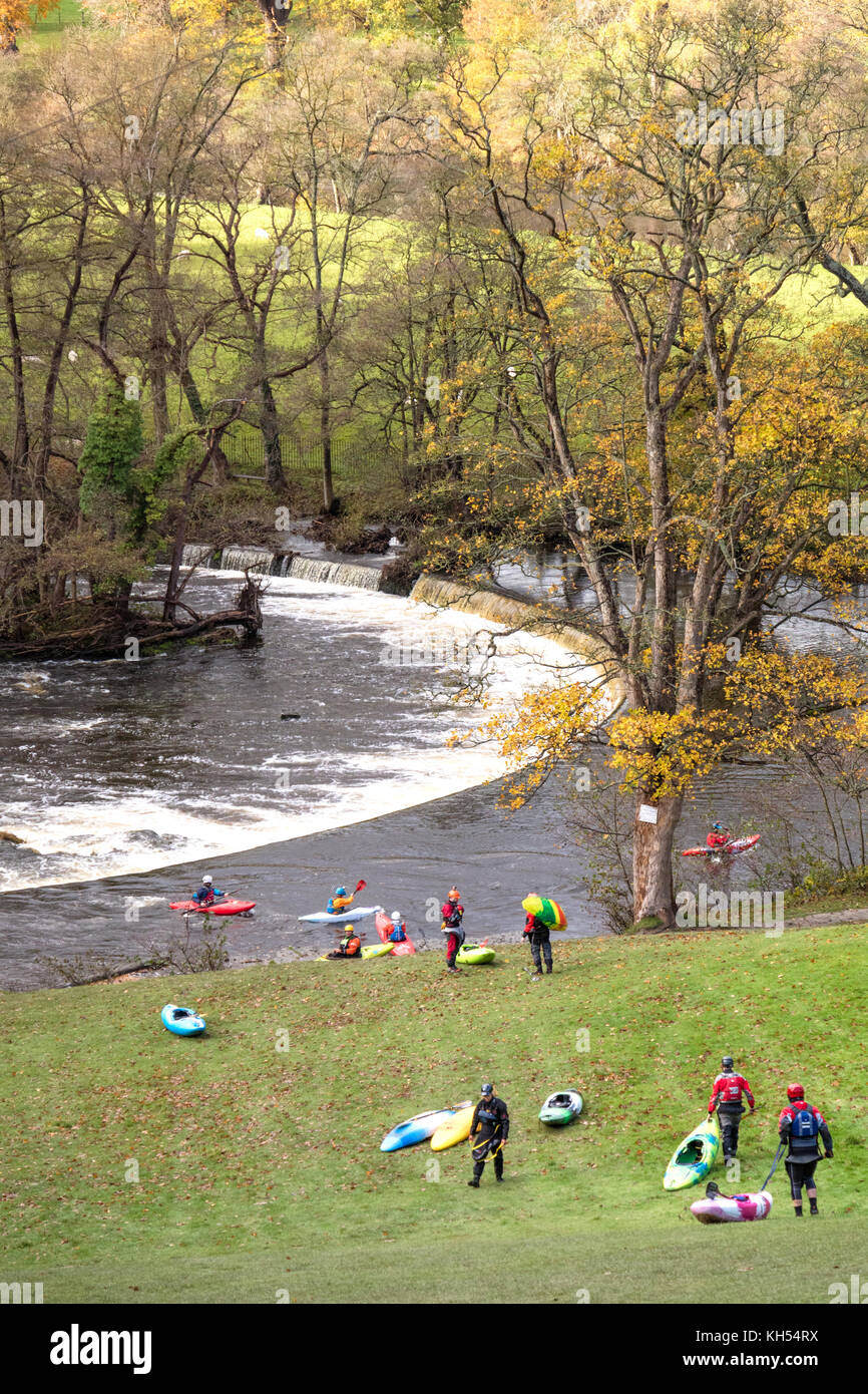 Autumn day and Kayakers on the River Dee at Horseshoe Falls near Llangollen, North Wales, UK Stock Photo