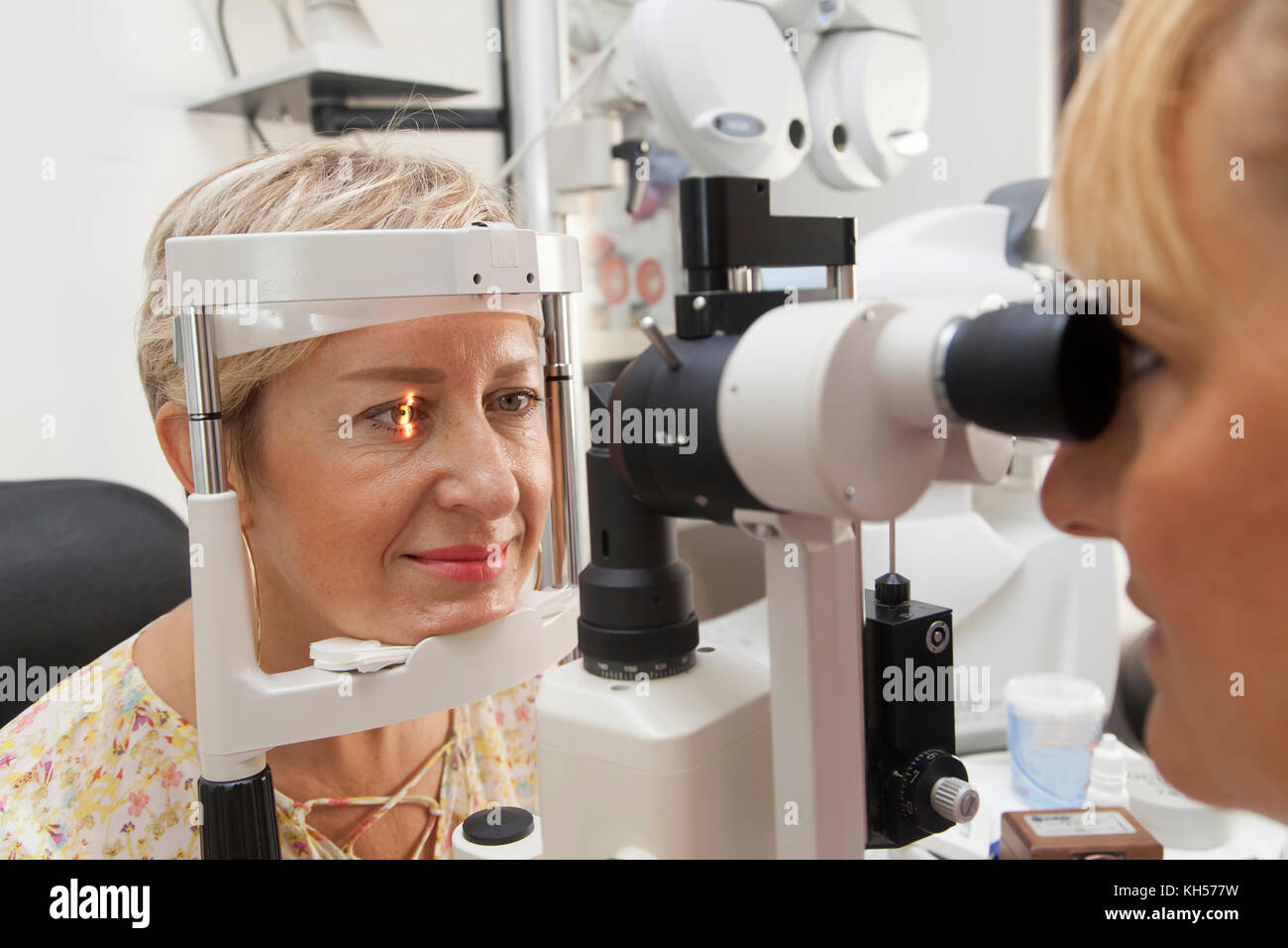 Young woman is being examined of her eyesight by optometrist Stock Photo