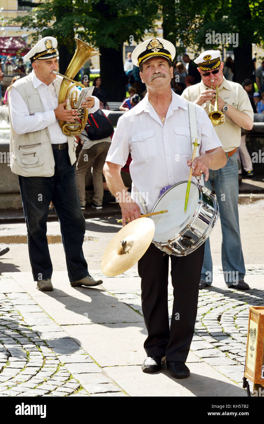 31.07.2016 .Russia.Saint-Petersburg.Musicians on a city street.Additional income to the family budget. Stock Photo