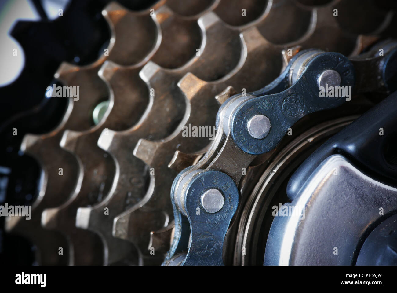 Machinery of bicycle, macro photography of chain covered with grease