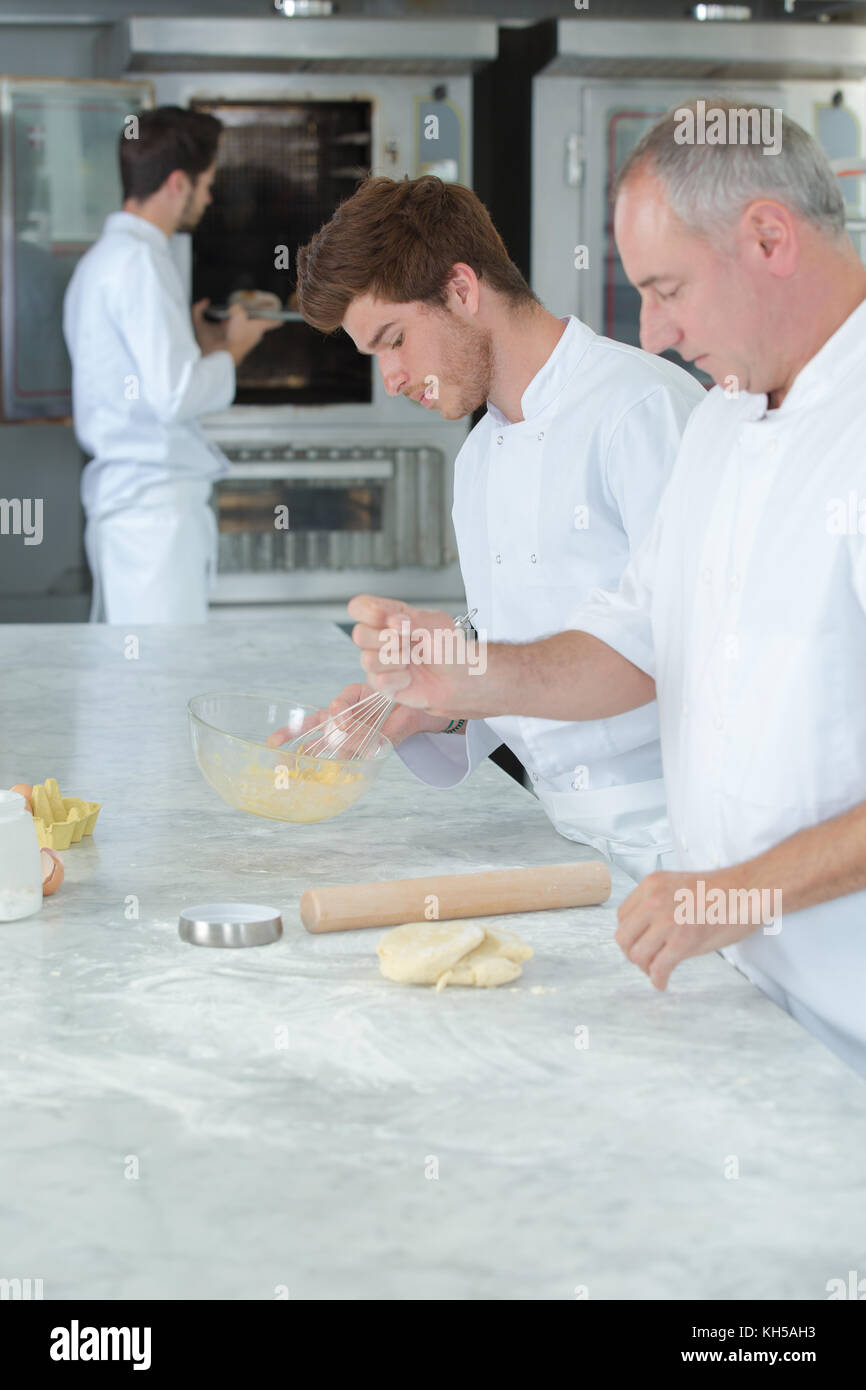 Young chef making pastry Stock Photo Alamy