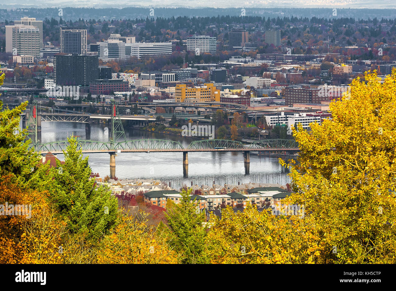 Hawthorne Bridge over Willamette River in downtown Portland Oregon in Fall Season Stock Photo