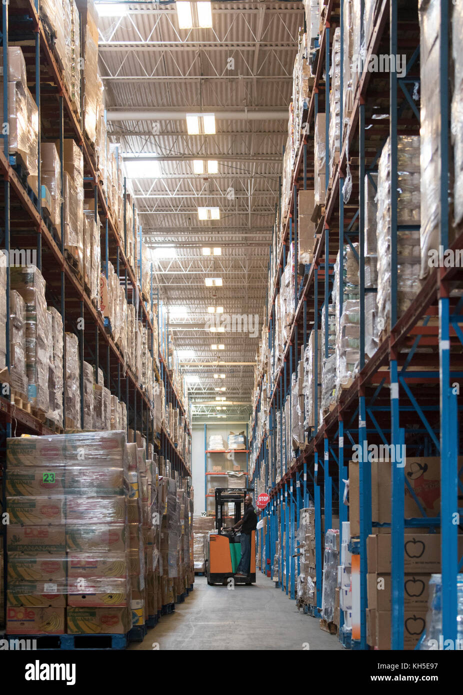 Pallets of USDA Emergency Food Assistance Program (TEFAP) commodities wait on the Houston Food