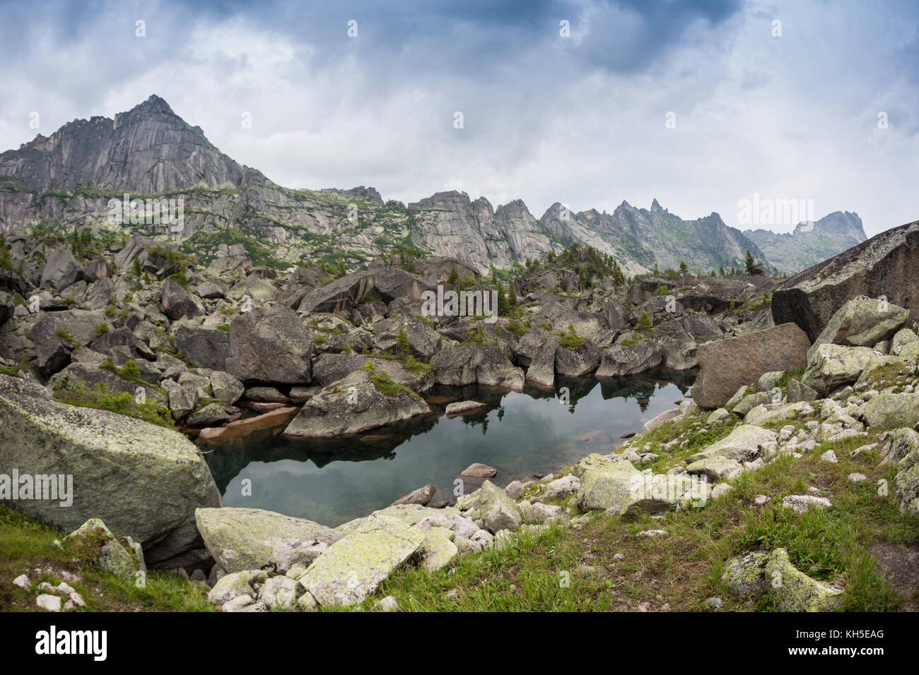 Mirror reflections in Lake Harmony in the high mountains of Ergaki, Russia. Stock Photo