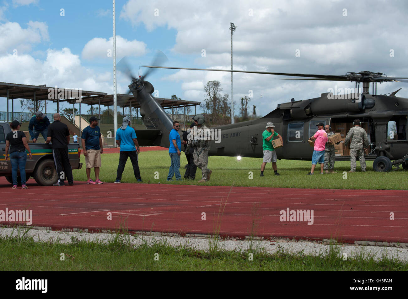 National Guardsmen deliver pallets of food and water to impacted areas