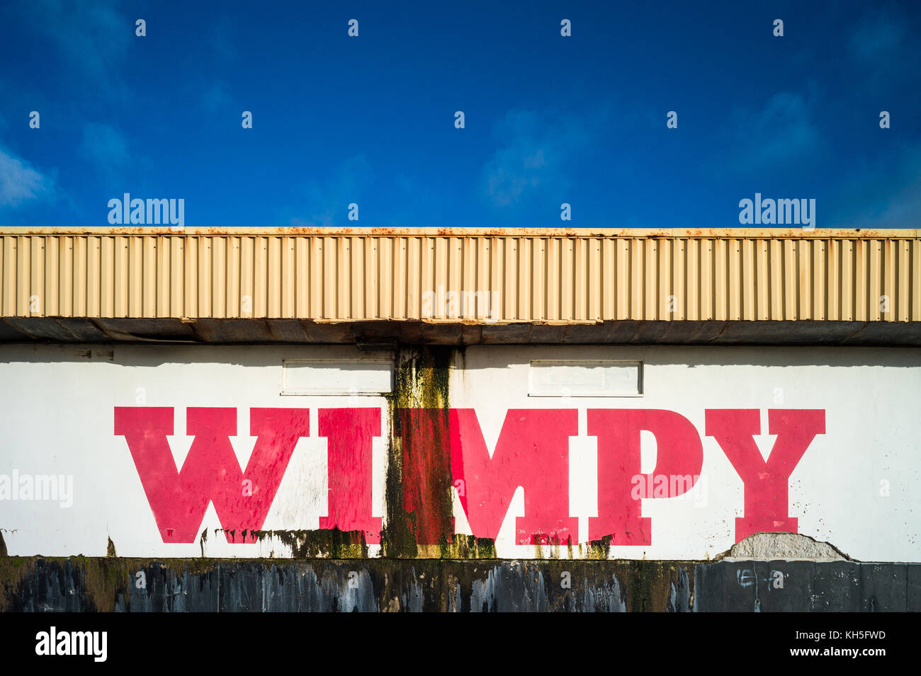 Seaside Wimpy Bar Restaurant in Porthcawl in South Wales. The weathered beachside restaurant is near the Coney Beach funfair. Stock Photo