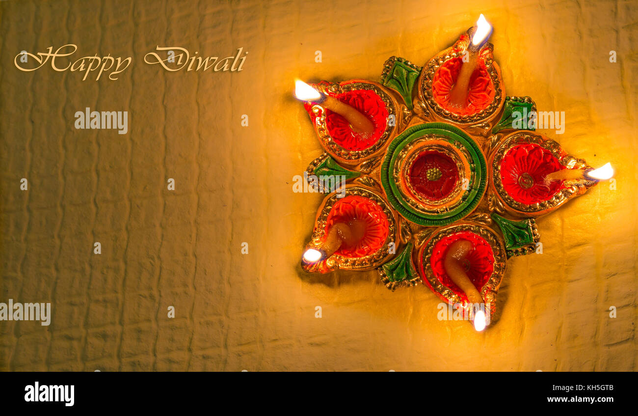 Diwali colorful decorative clay diya lamps for background greetings content  Stock Photo - Alamy