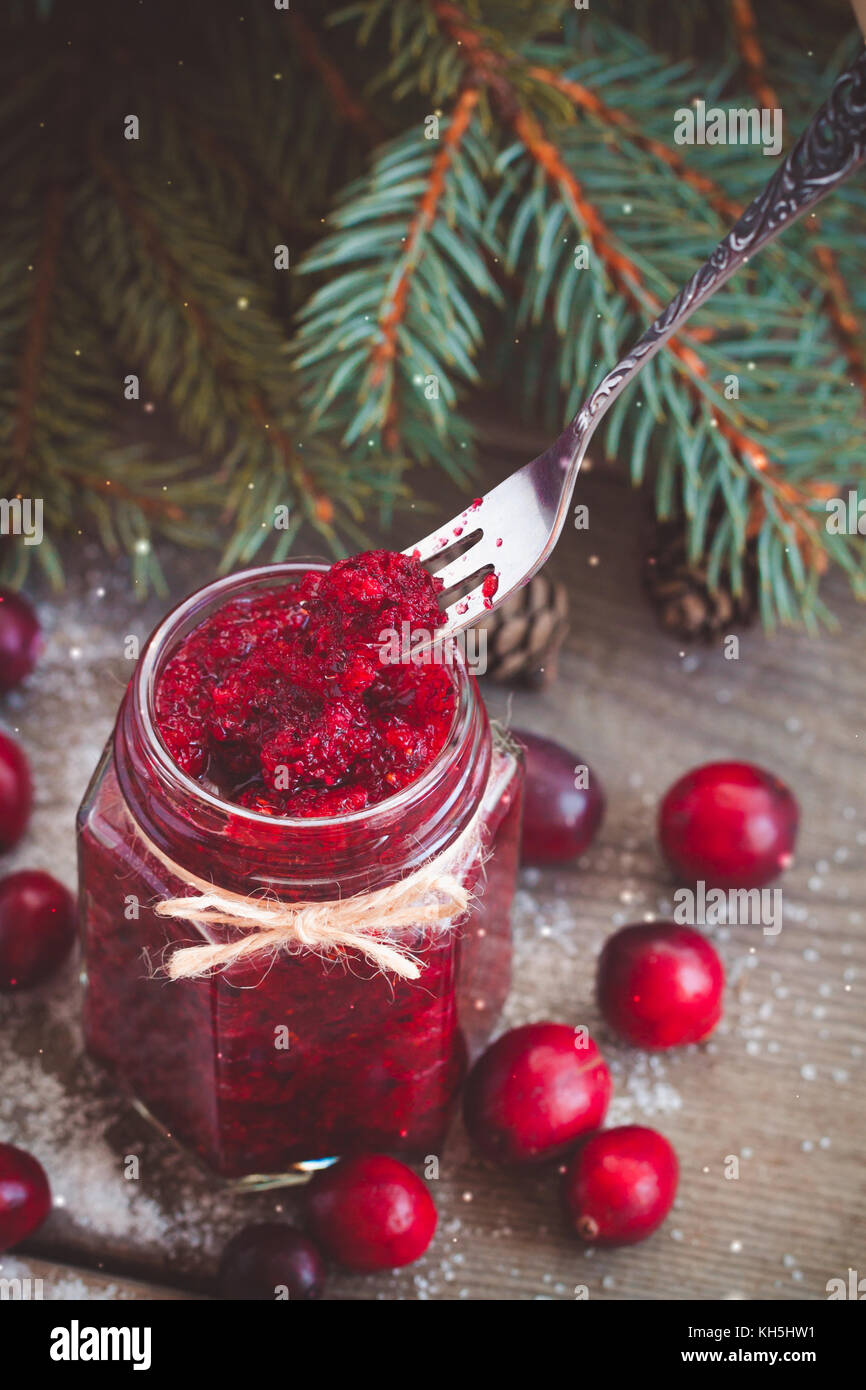 Cranberry Jam And Fersh Cranberries In Sugar On An Old Rustic