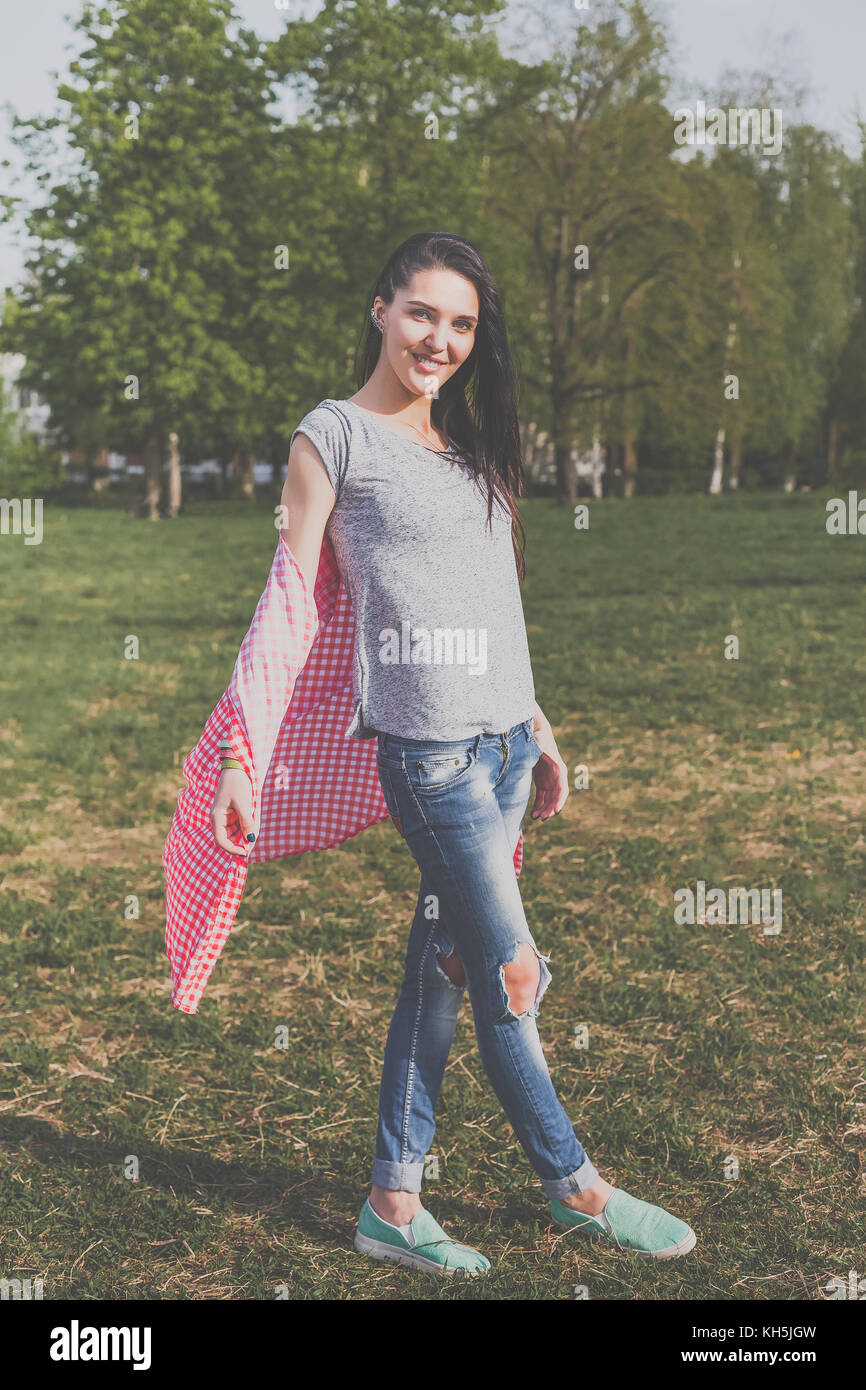 positive hipster girl in green nature Stock Photo - Alamy