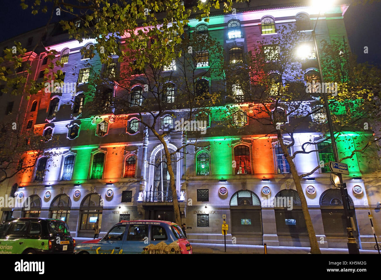 View of India House on the Aldwych in London brightly illuminated with coloured lights at night Stock Photo
