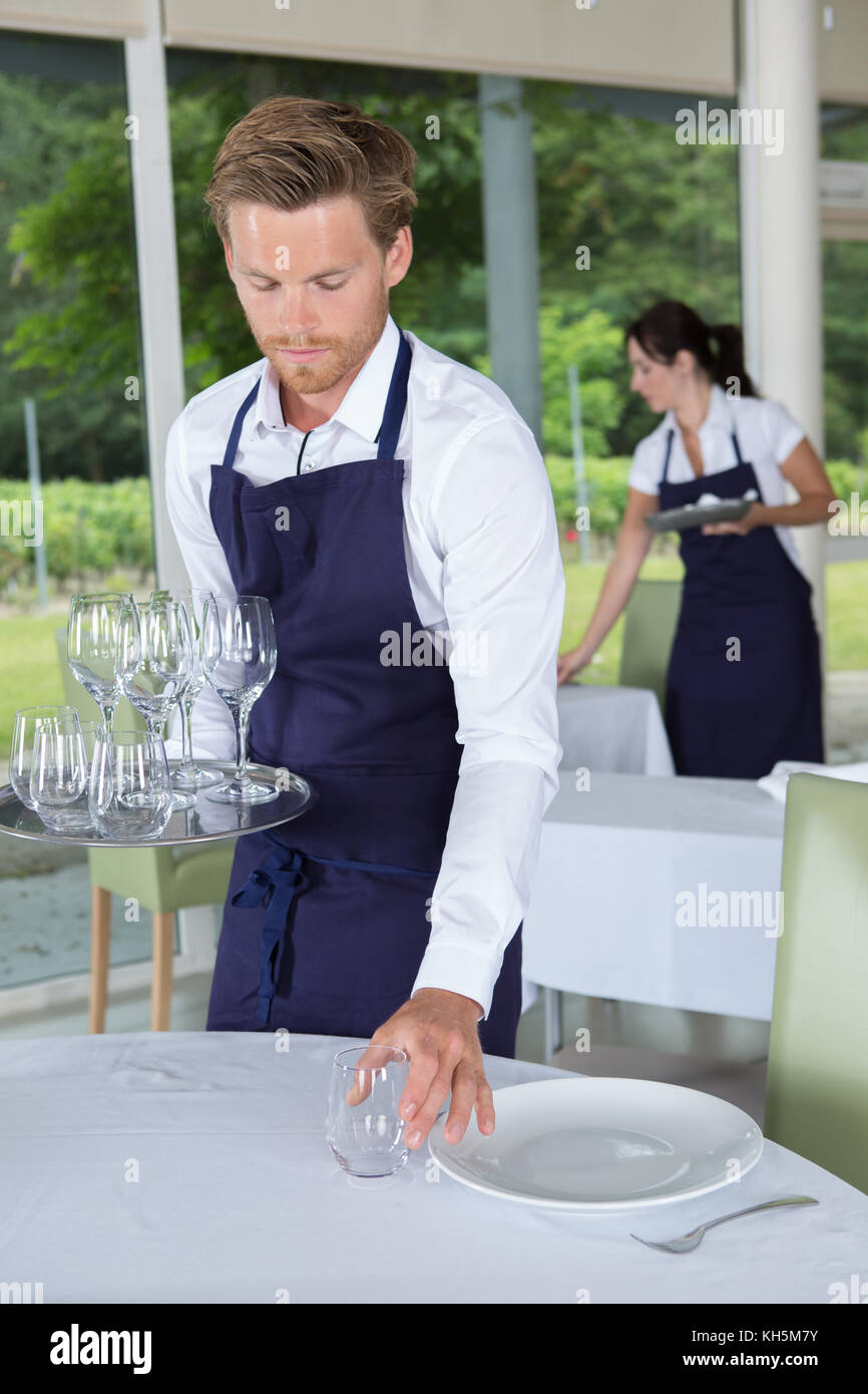waiter table setting Stock Photo Alamy