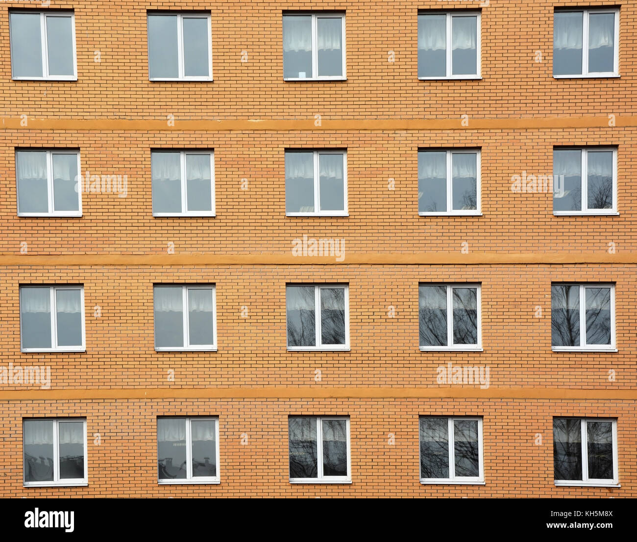 Architectural background- windows and home wall from yellow brick Stock ...