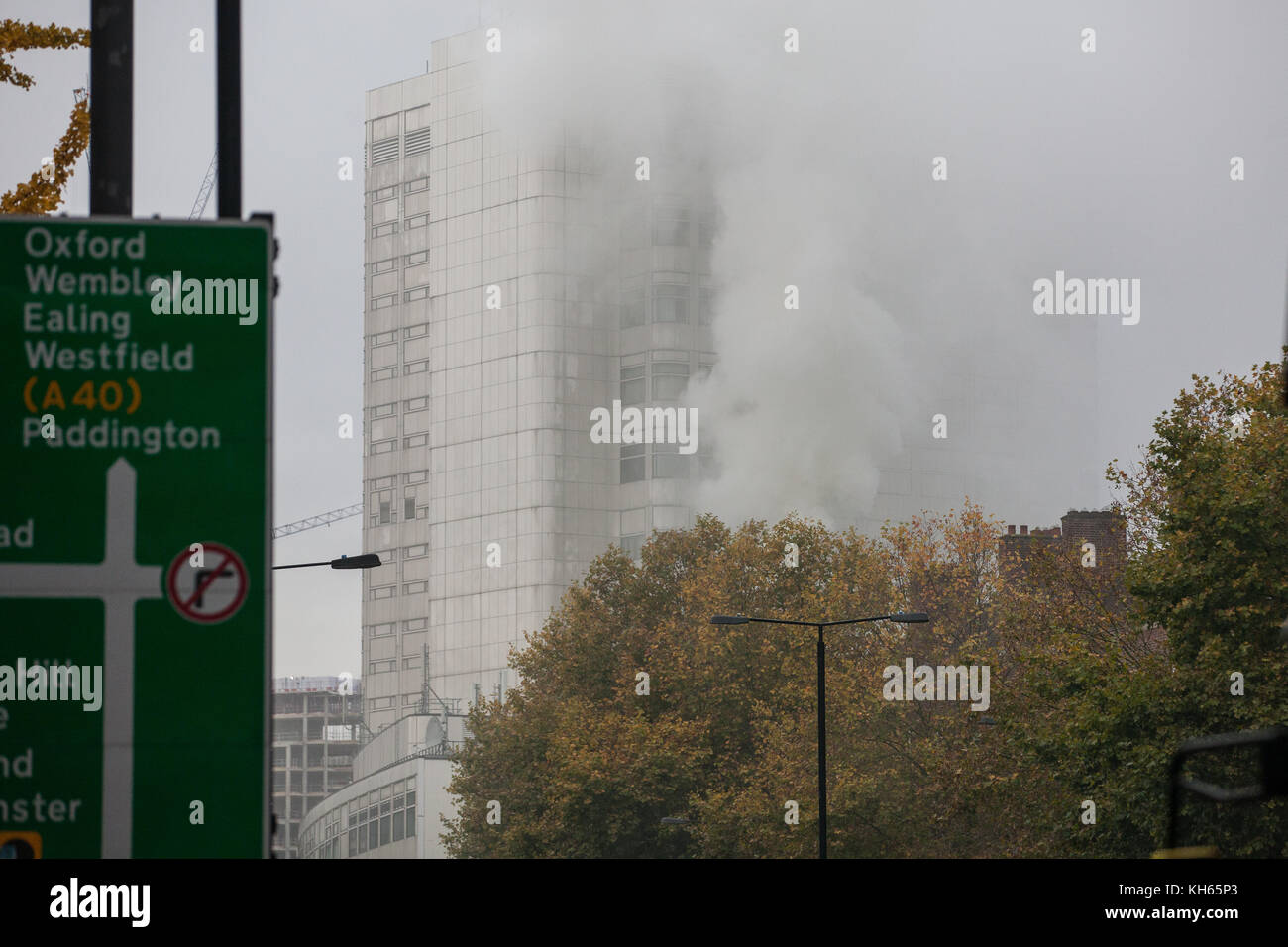 London, UK. 14th Nov, 2017. Acrid smoke rises from the roof of a tower block on Marylebone Road close to Edgware Road tube station. London Fire Brigade appliances attended the fire. Credit: Mark Kerrison/Alamy Live News Stock Photo