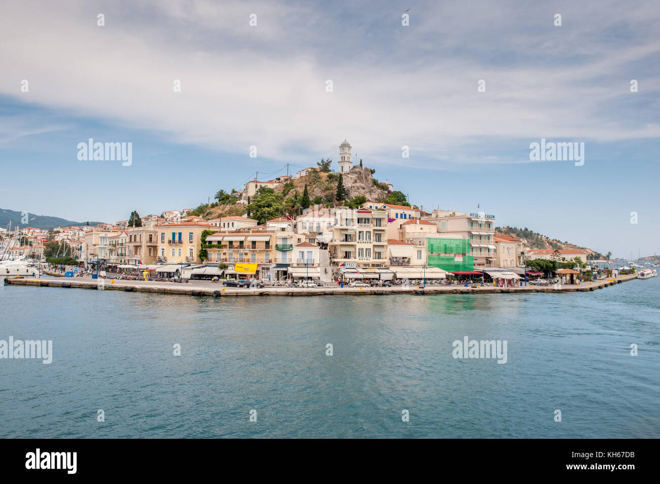 Poros viewd from a ferry. Poros is a small Greek island in the Aegean sea belonging to the Saronic islands. Stock Photo