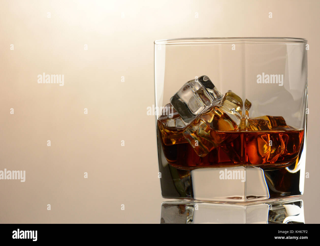 Scotch on the rocks a drink with cubes of ice Stock Photo Alamy
