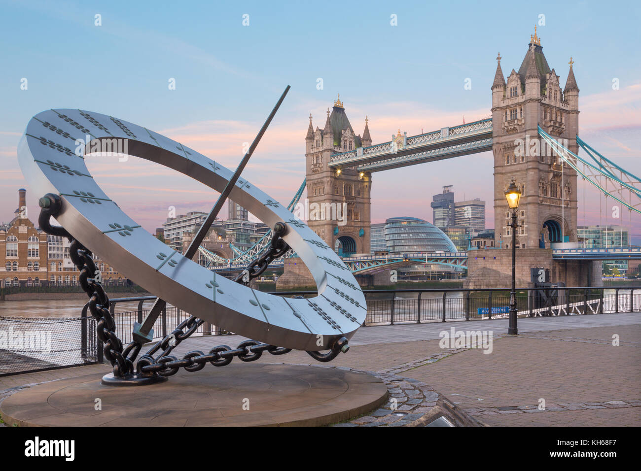 LONDON, GREAT BRITAIN - SEPTEMBER 14, 2017:  The Tower Bride and sun clock on the riverside in morning light. Stock Photo