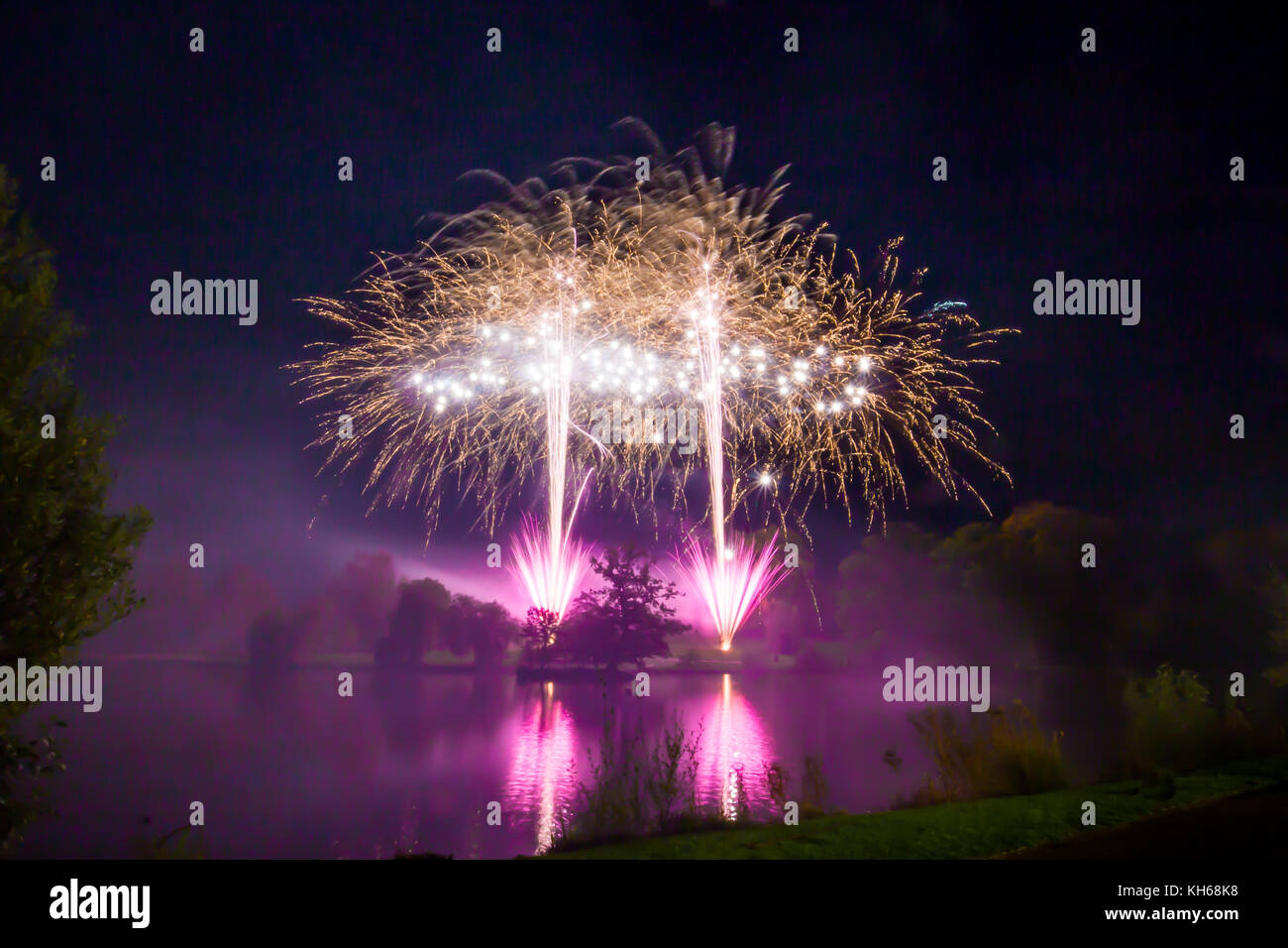 Firework display across the lake at Dunorlan Park, Tunbridge Wells Kent