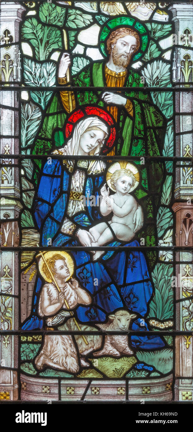 LONDON, GREAT BRITAIN - SEPTEMBER 17, 2017: The Holy Family on the stained glass in church Holy Trinity Brompton. Stock Photo