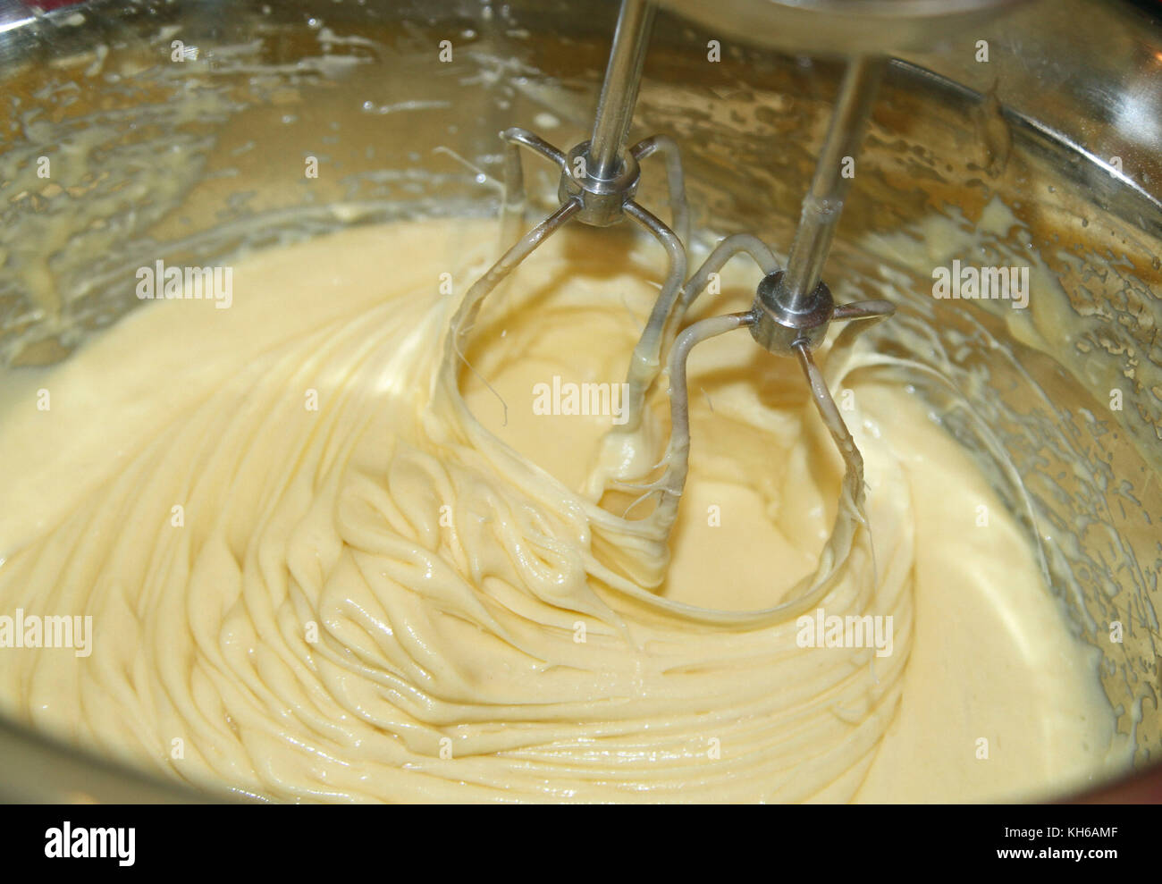 Mixing eggs and flour Stock Photo Alamy