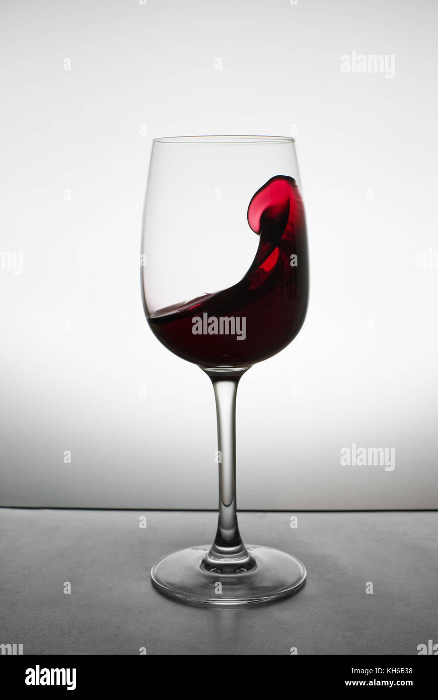 red wine splashing in glass Stock Photo Alamy