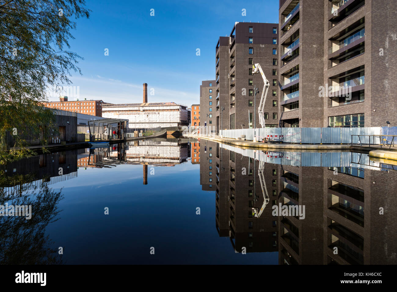 Murrays' Mills and the Cotton Field Wharf apartment blocks reflected in the Cotton Field Park
