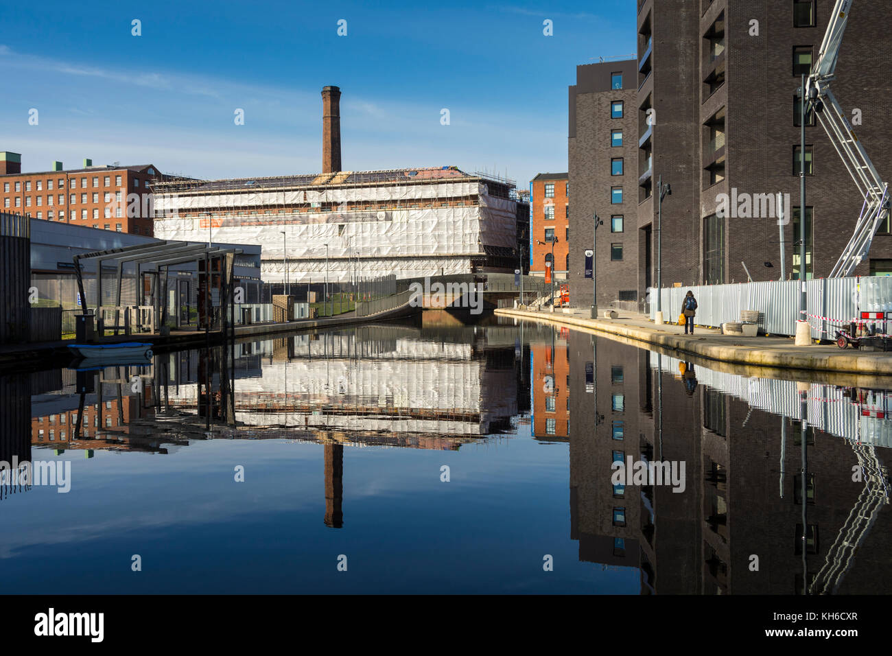 Murrays' Mills and the Cotton Field Wharf apartment blocks reflected in the Cotton Field Park