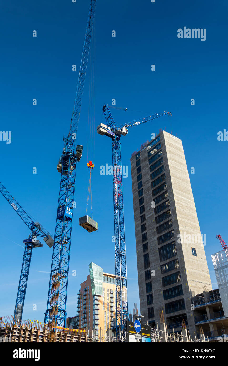 The Angel Gardens apartments development, under construction, Manchester, England, UK. Behind is