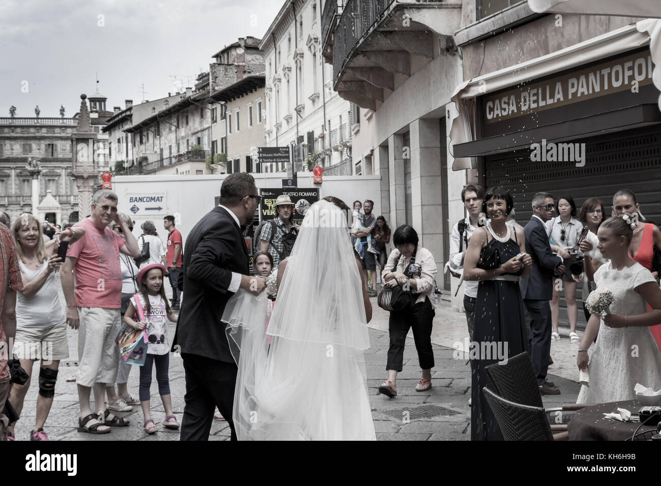 Bride And groom celebrated them wedding in Piazza della Erbe, Verona, Italy. Stock Photo