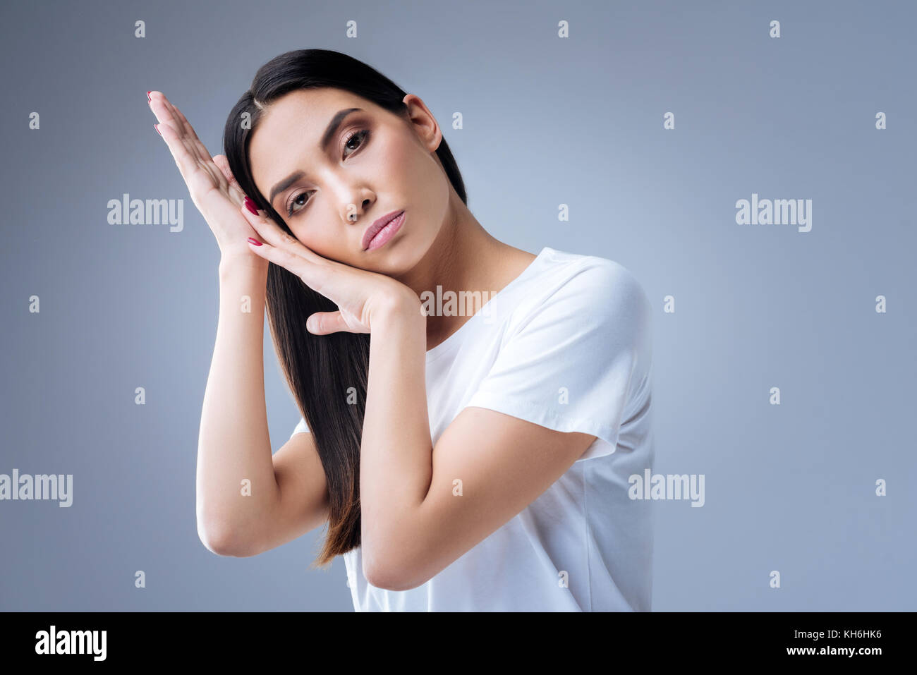 Talented beautiful dancer creating a new interesting position Stock Photo