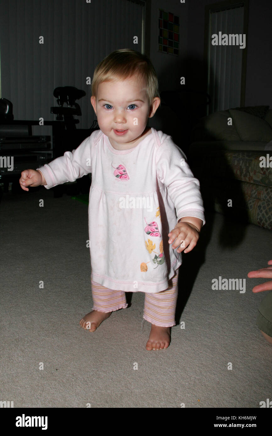 9 month old girl, first steps Stock Photo Alamy