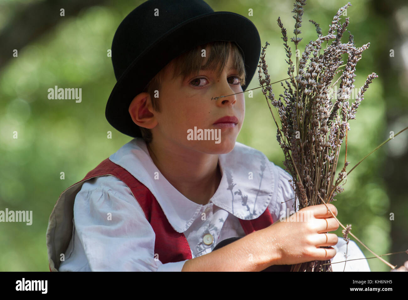 Pays de Sault. Lavender festival, young boy in costume. Stock Photo