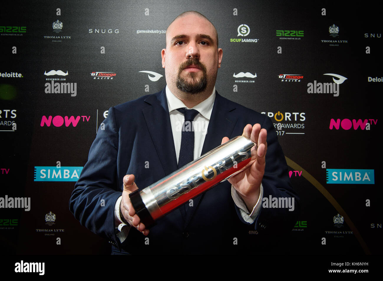 Journalist Richard Lewis with the Esports Game of the Year award, for Counter Strike - Global Offensive, backstage at the NOW TV Esports Industry Awards 2017, at the Brewery in London. PRESS ASSOCIATION Photo. Picture date: Monday November 13th, 2017 Photo credit should read: Matt Crossick/PA Wire. Stock Photo