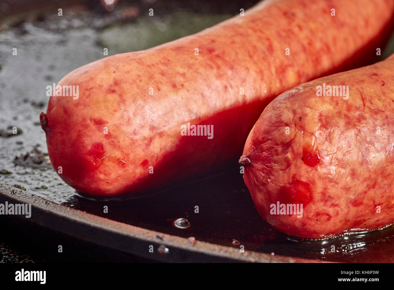 Pennsylvania Dutch style smoked sausages on a cast iron grill Stock Photo Alamy