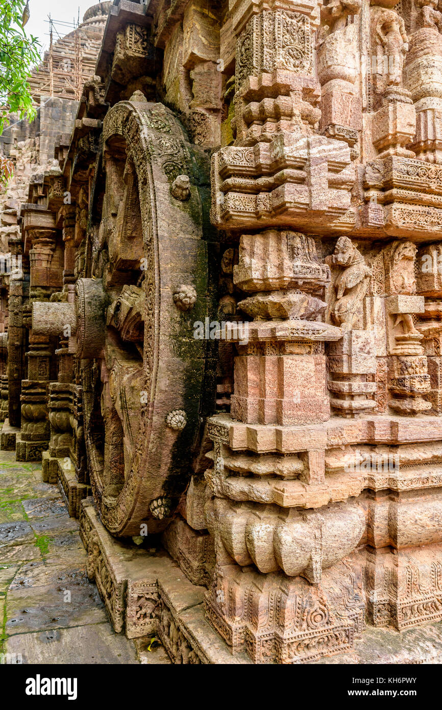 Intricate carvings on a stone wheel in the ancient  Hindu Sun Temple at Konark, Orissa, India. Stock Photo