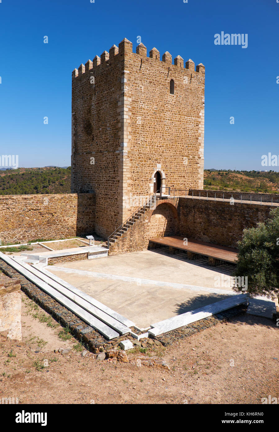 Keep tower of Mertola Castle with the adjoining fortress wall with battlements. Mertola. Portugal Stock Photo