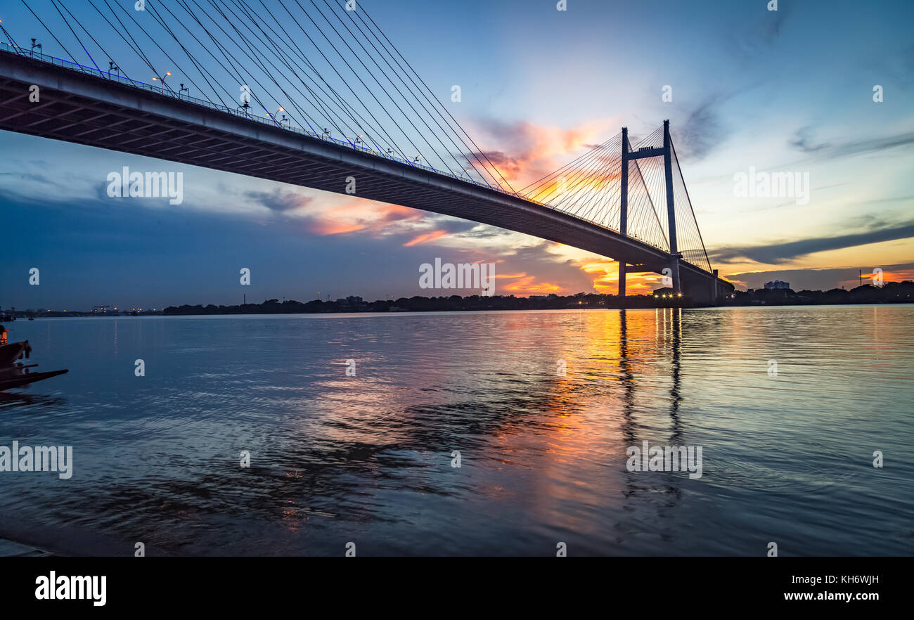 Vidyasagar Setu - The Cable stayed bridge on river Hooghly at sunset. Photograph taken from Princep Ghat Kolkata India Stock Photo