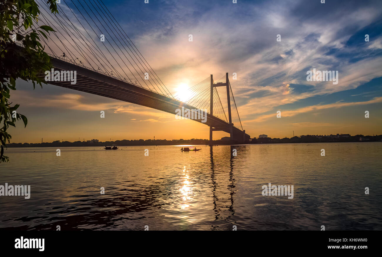 Vidyasagar Setu - The Cable stayed bridge on river Hooghly at sunset. Photograph taken from Princep Ghat Kolkata India Stock Photo