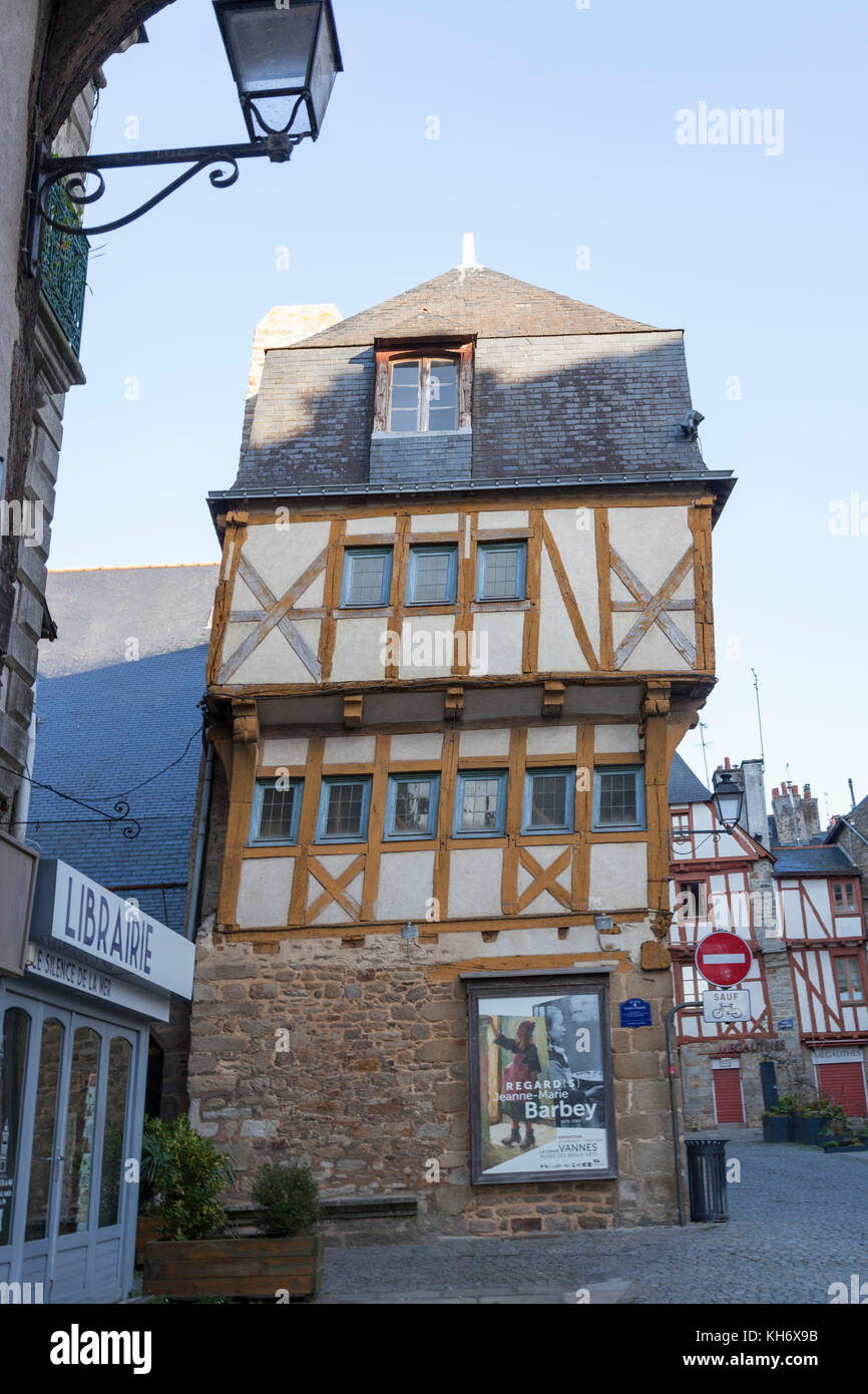 A successful restoration of a half-timbered house in the Vannes historic centre (France).This askew building is located Saint Peter square. Stock Photo