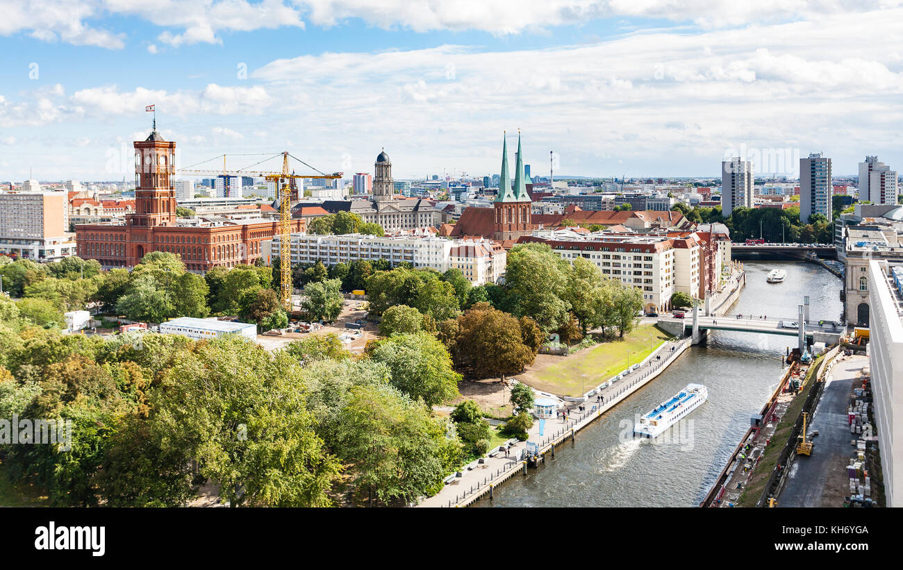 travel to Germany - above view of Spree River with Rathausbrucke near Rotes Rathaus (Red City Hall) and Nikolaikirche (St Nicholas Church) in Berlin c Stock Photo