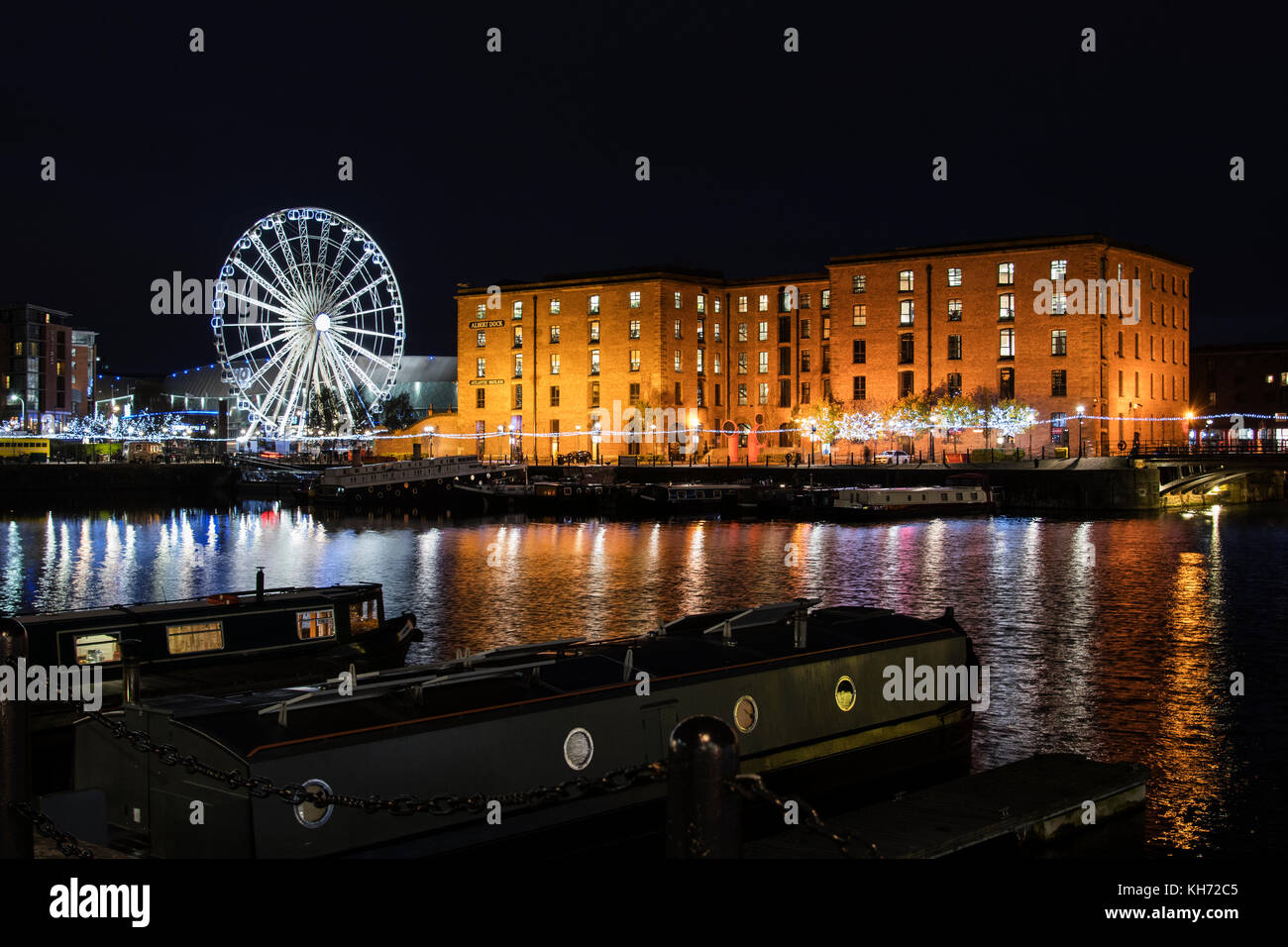 Albert Dock warehouse buildings reflected in Salthouse Dock in Liverpool. Stock Photo
