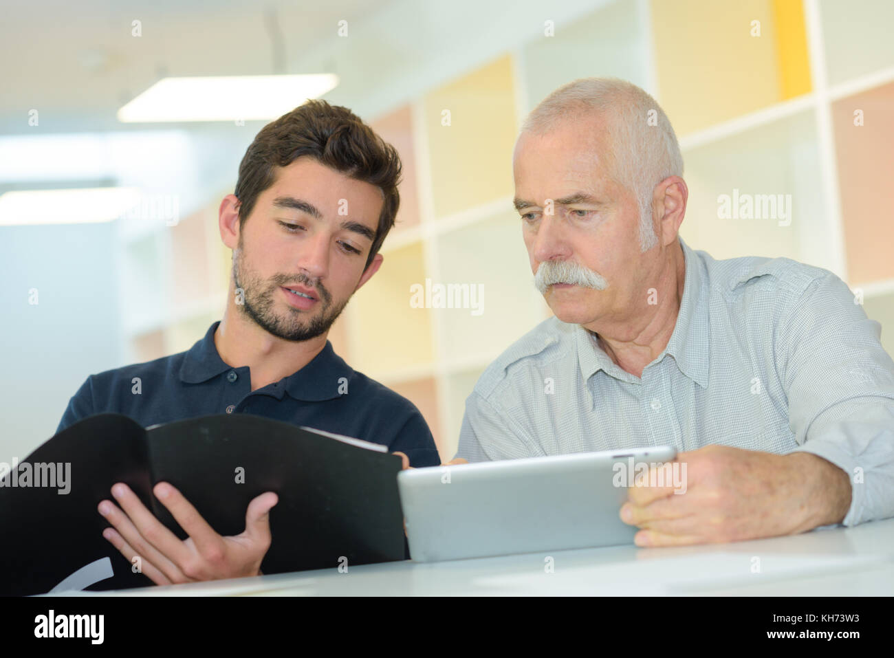 Comparing information hi-res stock photography and images - Alamy