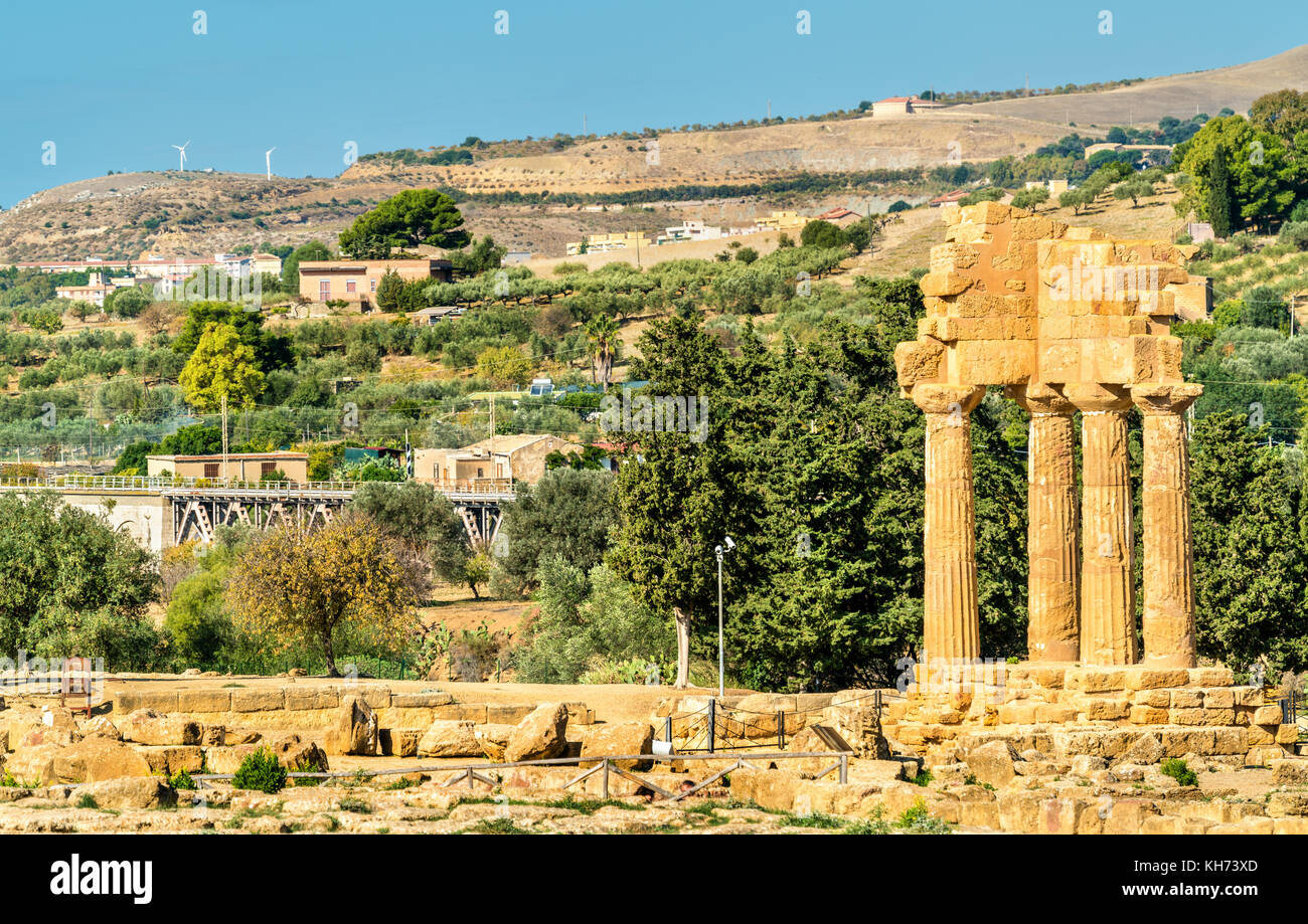 The Temple of Castor and Pollux at the Valley of the Temples in Agrigento - Sicily, Italy Stock Photo