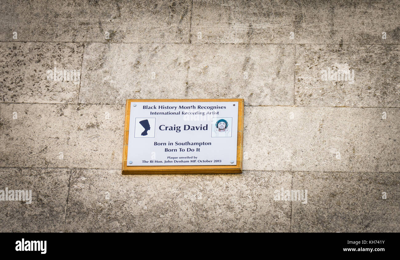 Black history month recognition plaque for recording artist Craig David on a building wall in Southampton city centre, England, UK Stock Photo