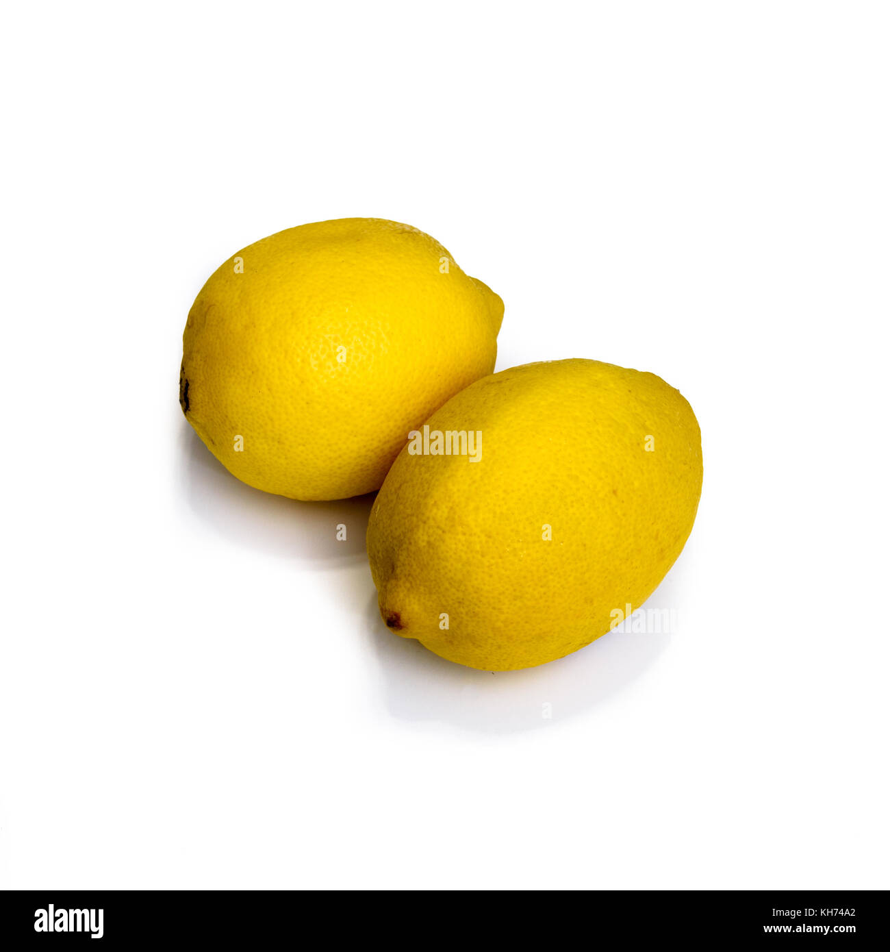 Two lemons isolated on a white background Stock Photo - Alamy