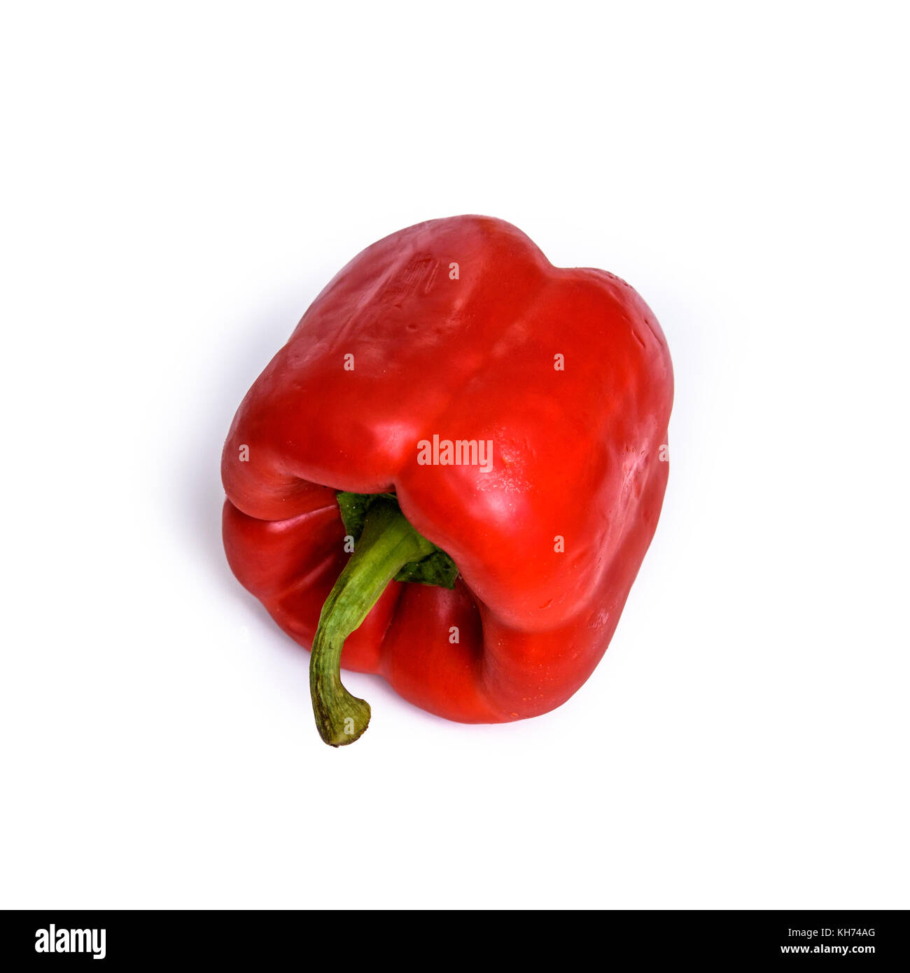 A red bell pepper isolated on a white background Stock Photo - Alamy