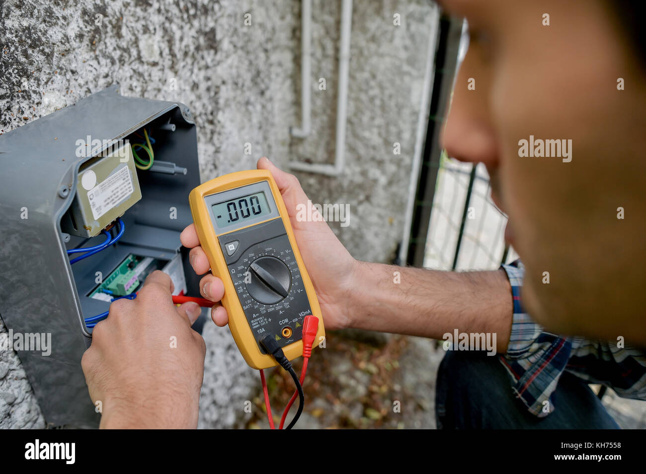 man reading meter Stock Photo