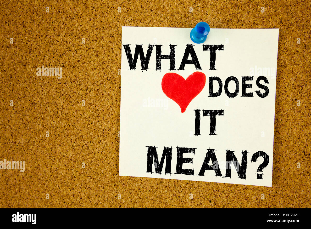 Conceptual hand writing text caption inspiration showing question What Does It Mean. Business concept for question and unknown love written on sticky note, reminder cork background with copy space Stock Photo